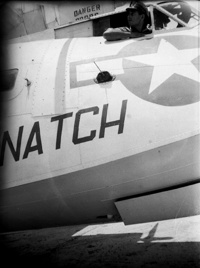 A US serviceman and a PBY named \'The Snatch\' in the CBI.