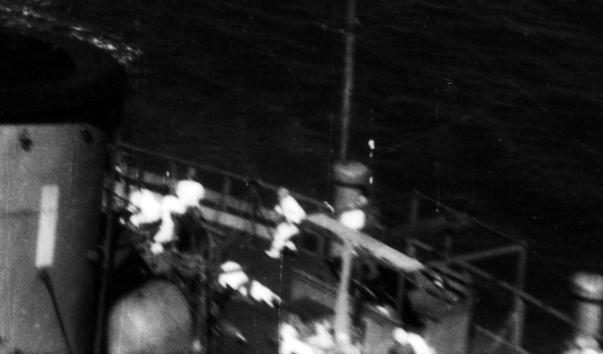 White suited sailors in action during the raid on Hong Kong harbor