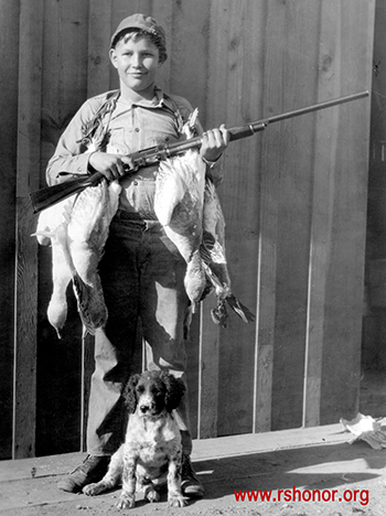 Fenslers grew up an active youth in the Tule Lake, California, area, as in this image, as a young hunter with his dog.