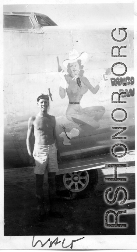 Flyer Walter Wegner poses with B-25J-185-CO bomber "Rangoon Rangler," serial #44-40857. 10th Air Force, 7th Bombardment Group, 9th Bombardment Squadron. The starboard side of the aircraft has "Cactus Kid" artwork.  During WWII.