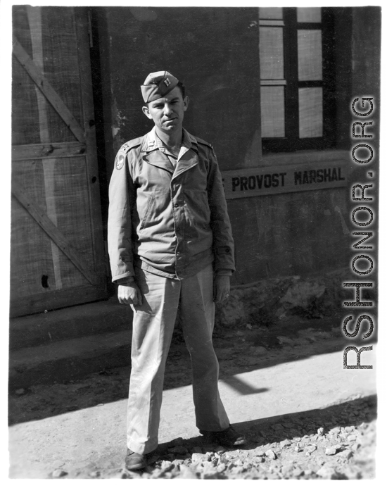 GI Posing before Base Provost Marshal Office in China, during WWII.