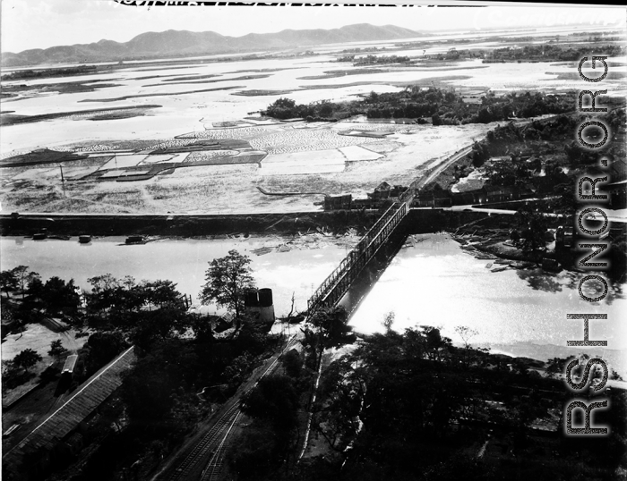 Bombing on Phu Lang Thuong railway bridge over the Thuong River at Bắc Giang City in French Indochina (Vietnam), during WWII. In northern Vietnam, and along a critical rail route used by the Japanese.  Coordinates:  21°16'32.69"N 106°11'9.28"E