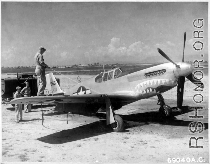 At this point, with full unit markings not yet applied, GIs in China use a decontamination unit to wash down the North American P-51 #42-106971 nicknamed "Big Blue Eyes." August 7, 1944.  The "Mustang" fighter and pilot were lost on January 14, 1945 while assigned to the 8th Fighter Squadron (Provisional), 3rd Fighter Group (Provisional), CACW, with 1LT Van N. Moad, Jr. at the controls.