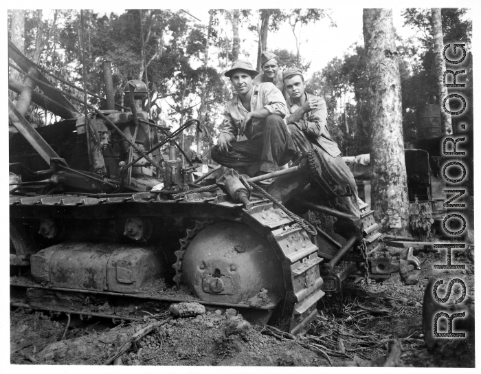 797th Engineer Forestry Company in Burma, repair bulldozer used for logging for bridge building along the Burma Road.  During WWII.