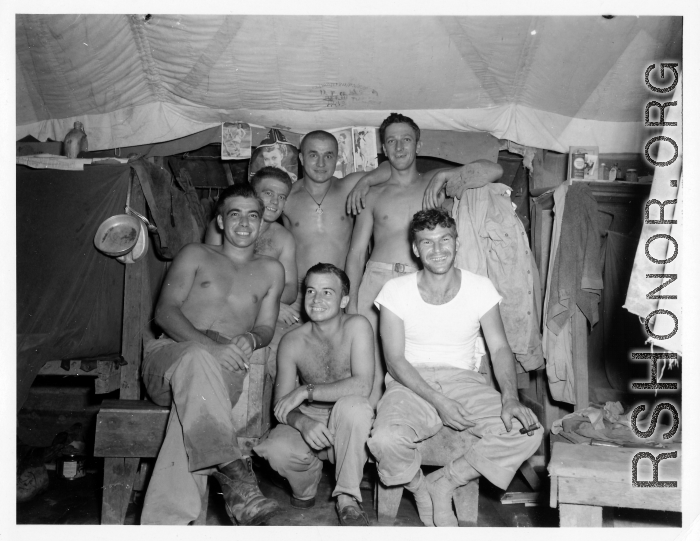 Engineers of the 797th Engineer Forestry Company pose in their barracks/tent in Burma.  During WWII.