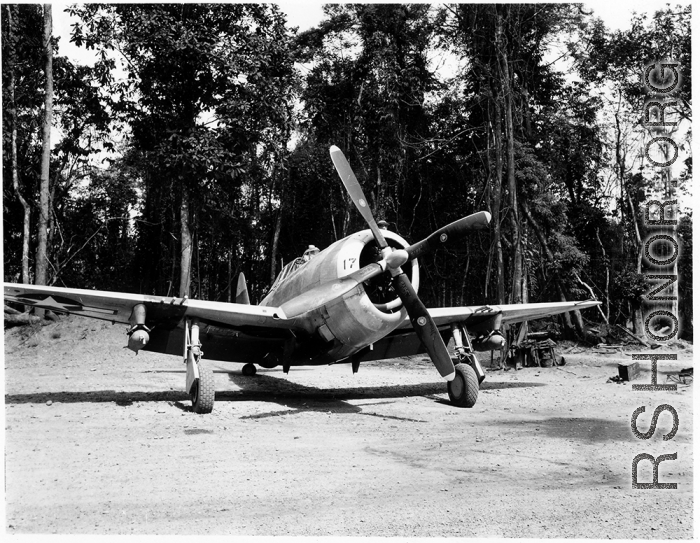 A Republic P-47 Thunderbolt at an airstrip in Burma.  Aircraft in Burma near the 797th Engineer Forestry Company.  During WWII.