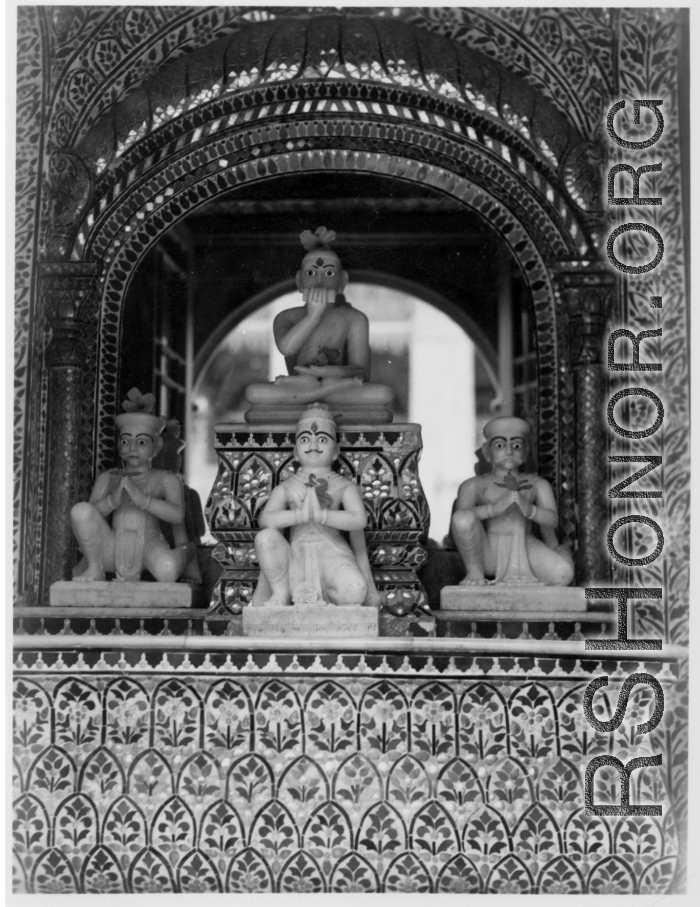 Small ornate altar.  Scenes in India witnessed by American GIs during WWII. For many Americans of that era, with their limited experience traveling, the everyday sights and sounds overseas were new, intriguing, and photo worthy.