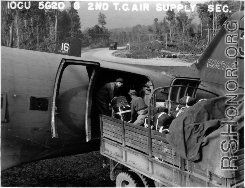 10CU 5G20 8 2ND T.C. AIR SUPPLY SEC.  Loading pre-parachuted boxes for drop into battle zone.