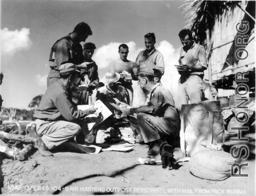 10AF 13 FEB 1945 --- Air Warning Outpost PERSONNEL WITH MAIL FROM PACK, BURMA.