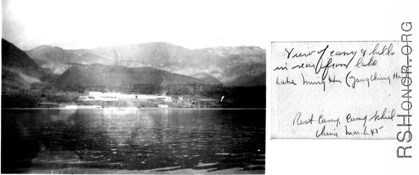 Camp Schiel rest camp in China during WWII, viewed from across the lake, taken from a small rubber raft raft or small recreational boat. March 1945.