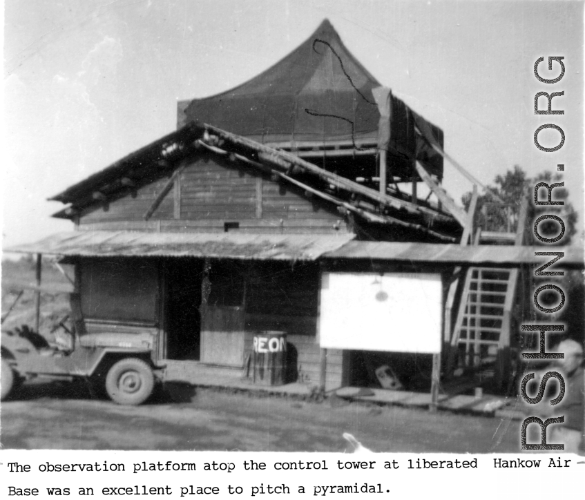 "The observation platform atop the control tower at liberated Hankou (Hankou) Air Base was an excellent place to pitch a pyramidal." During WWII.