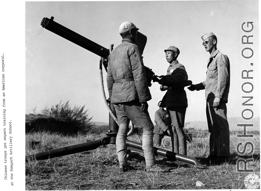 "Chinese troops get expert training from and American corporal at the Ramgarh Artillery School." During WWII.