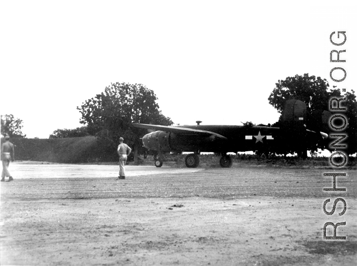#41-30387, an American B-25B bomber, taxis onto the 'engine run up area'  at Yangkai, Yunnan province, in the CBI.  (Image from the collection of Eugene Wozniak)