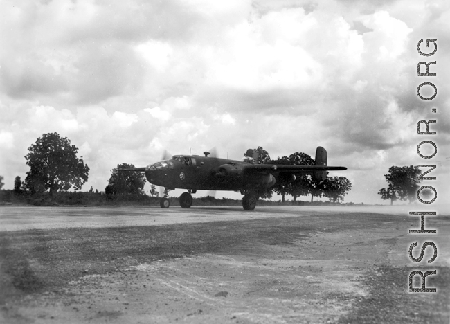 A B-25 of the Ringer Squadron in the CBI, with engines running.  From the collection of Wozniak, combat photographer for the 491st Bomb Squadron, in the CBI.