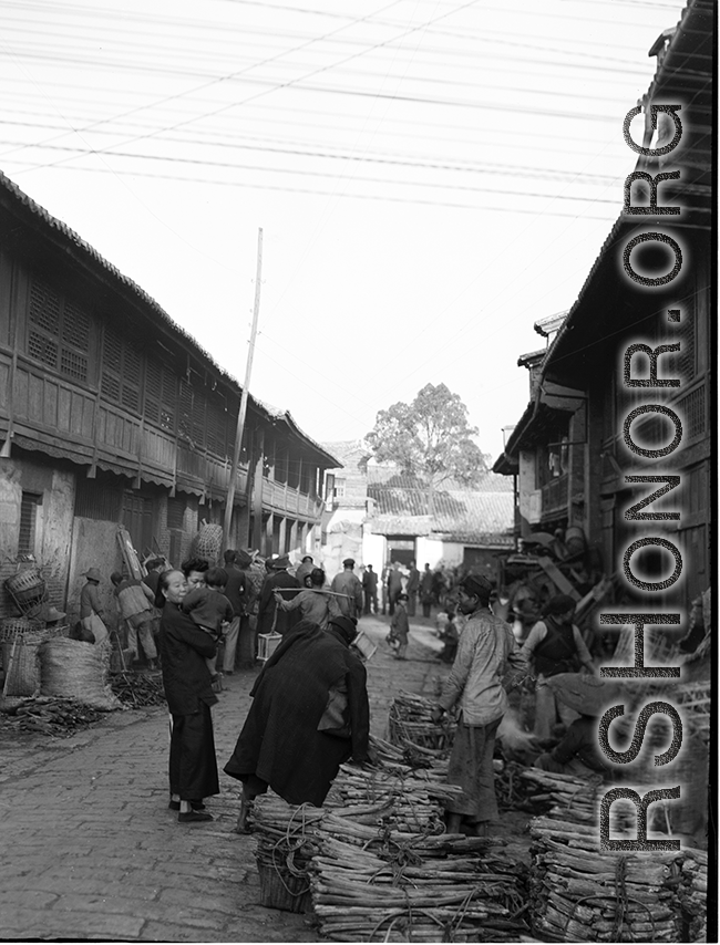 Village market street scene in Yunnan province, China, during WWII.  From the collection of Eugene T. Wozniak.