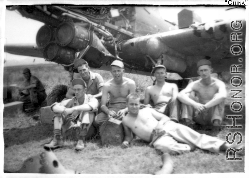 "Here Is A Group Of 396th Guys At Kwelin Taking A Break While Rebuilding One Of The P-40's. Souder, Reese, Kennedy, O'Connor, Rodriguez, and Thompson."