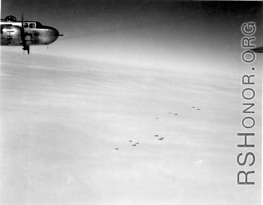 B-25 Mitchell bombers in flight in the CBI, in the area of southern China, Indochina, or Burma.