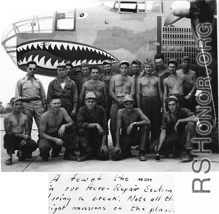 Men of the Aero-Repair Section, 61st Air Service Group, stand before a a B-25 in the CBI. "Note all the night missions on the plane."  From the collection of David Firman, 61st Air Service Group.