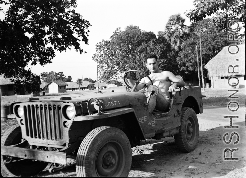 David Firman, 61st Air Service Group, at the wheels of a jeep nicknamed "Pee Wee"  in the CBI during WWII.  From the collection of David Firman, 61st Air Service Group.