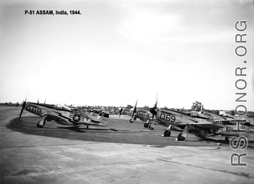 Numerous P-51s lined at Assam, India, 1944, including serials #473932, and #415582.