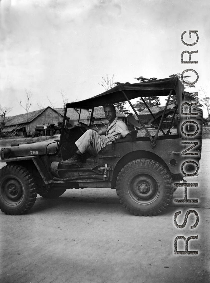 A GI in an jeep in India during WWII.  From the collection of David Firman, 61st Air Service Group.