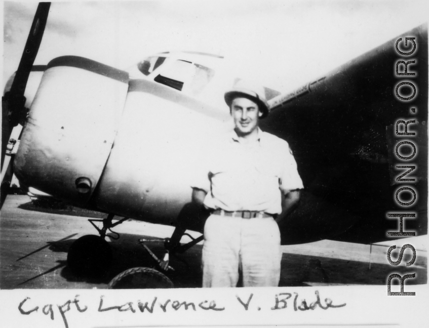 Capt. Lawrence V. Blade poses before an airplane during WWII.   From the collection of David Firman, 61st Air Service Group.