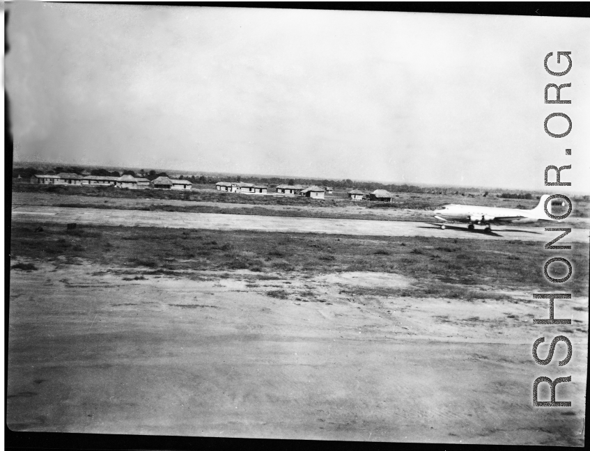 A C-54 on a runway in the CBI, probably Assam, India.    From the collection of David Firman, 61st Air Service Group.