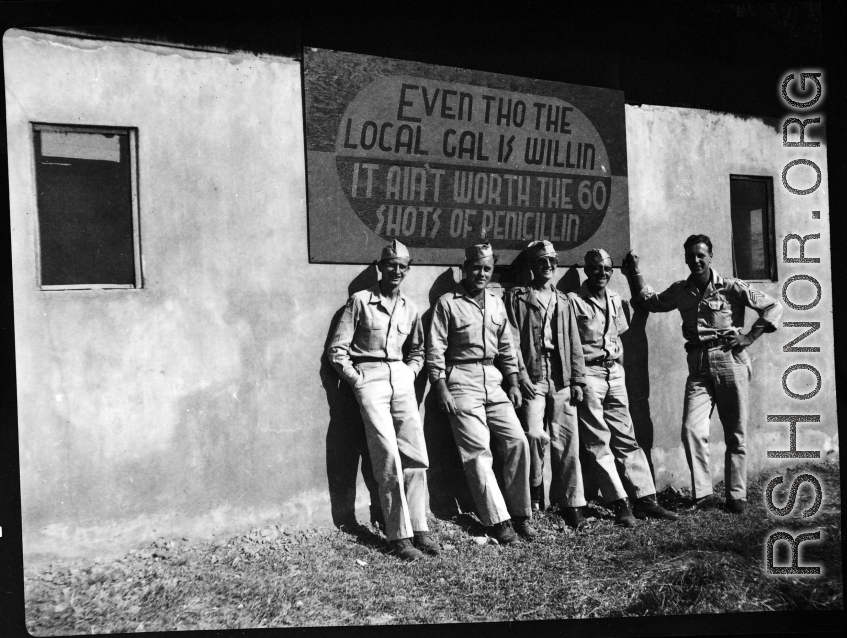 American GIs pose with STD sign in the CBI during WWII.    From the collection of David Firman, 61st Air Service Group.