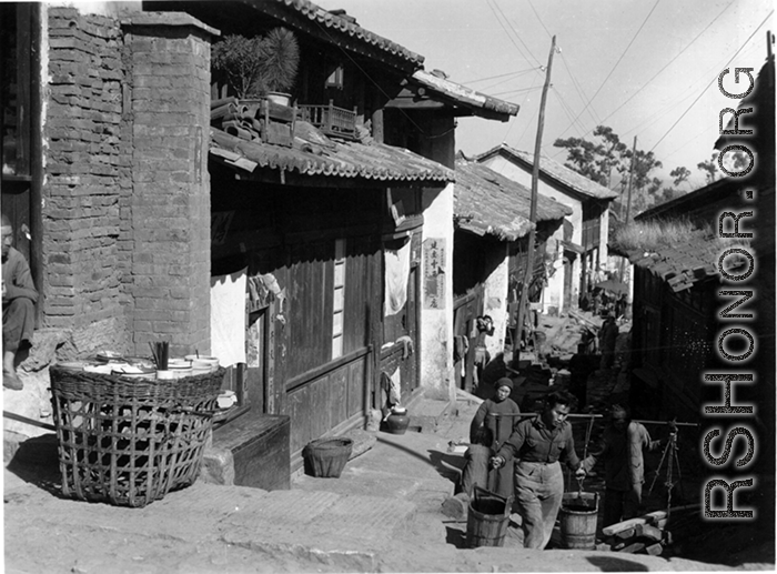 People go about their daily domestic lives in a small town in SW China during WWII.