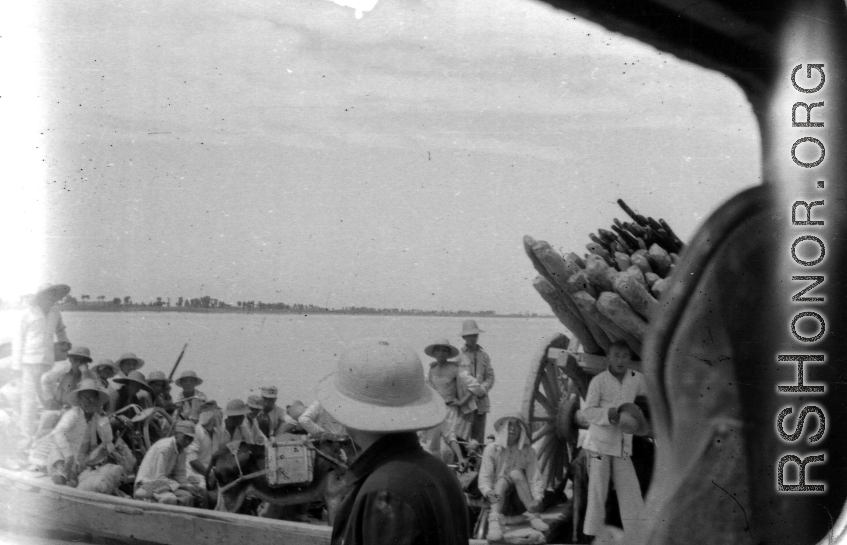 Edward Gable served in northern China: Boats passing, probably on the Yellow River, in a sweltering day. During WWII.