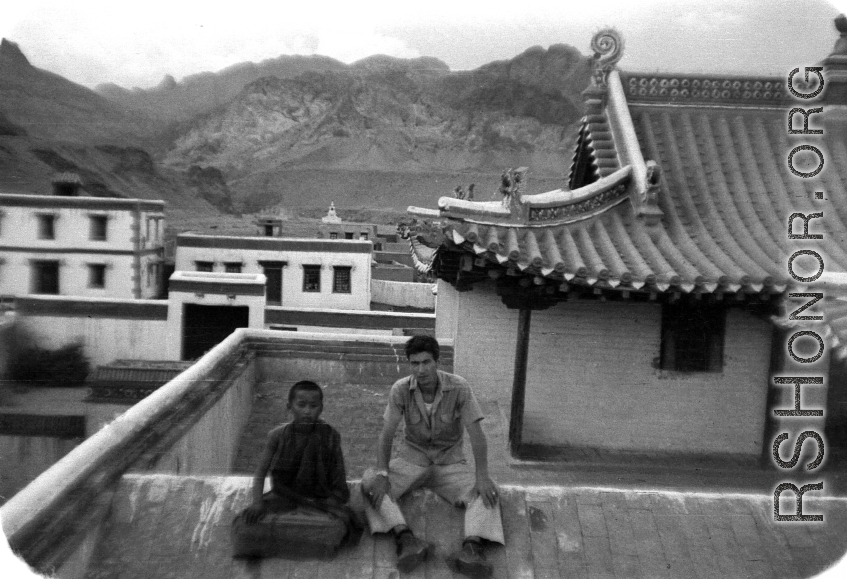 A GI of SACO poses with Lamist monk or trainee at a temple in northern China during WWII.