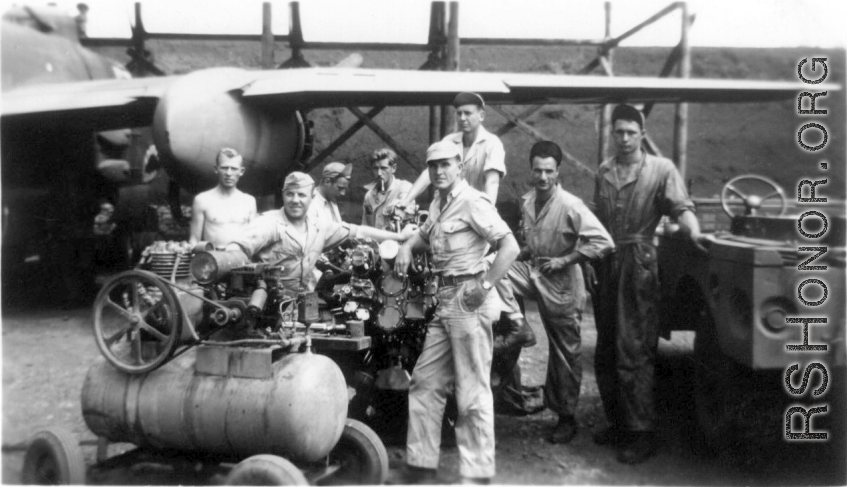 There were no hangars at Yangkai AB, nor any airbase in China. This required all aircraft maintenance to be performed in the open, regardless of weather conditions. These 491st Bomb Squadron mechanics are changing engines on squadron aircraft #444, "Shark Mouth", in the spring of 1944. Frenchy Beaudetter, George Butsika, John Burns, John Aspinwall, Karl Hammett, Frank Bert, Frank Bates.  (Info courtesy Tony Strotman) 
