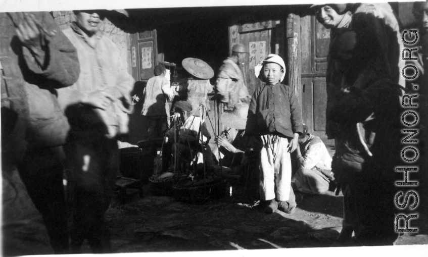Three old men and a boy with new clothes, Yangkai Village, Spring 1945  From the collection of Frank Bates.