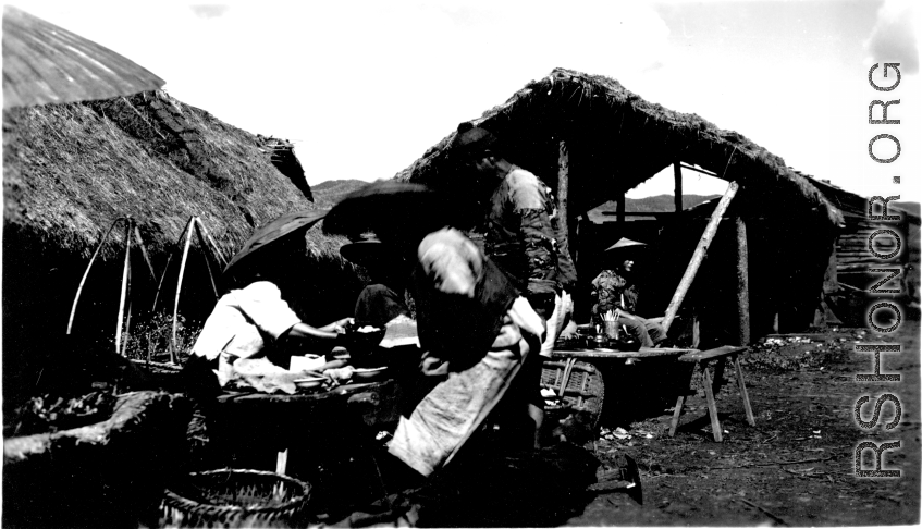 Outdoor restaurant stands in Yunnan, during WWII.