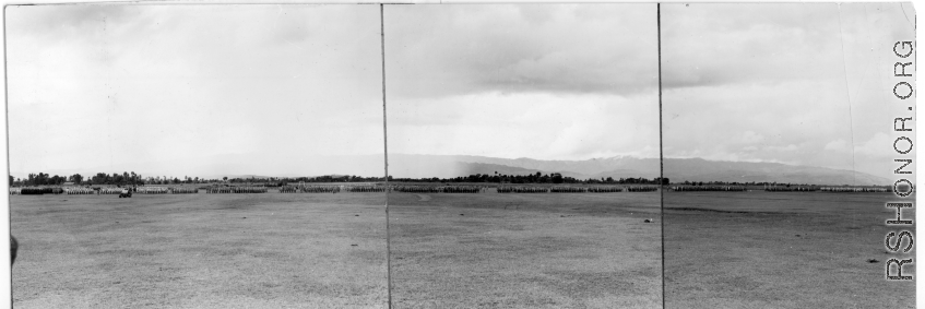 Panorama of Chinese soldiers in numerous ranks during exercises in southern China, probably Yunnan province, or possibly in Burma.