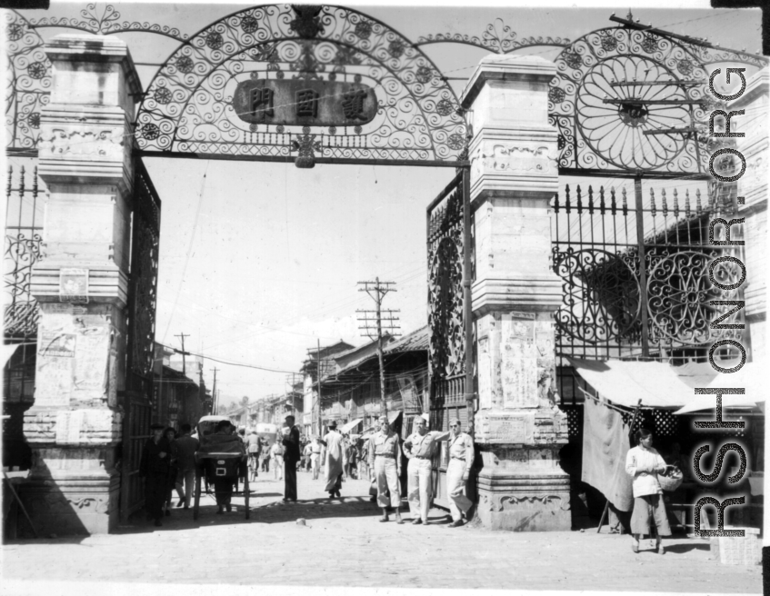 GIs pose at Huguomen gate (护国门) in Kunming, China, during WWII.