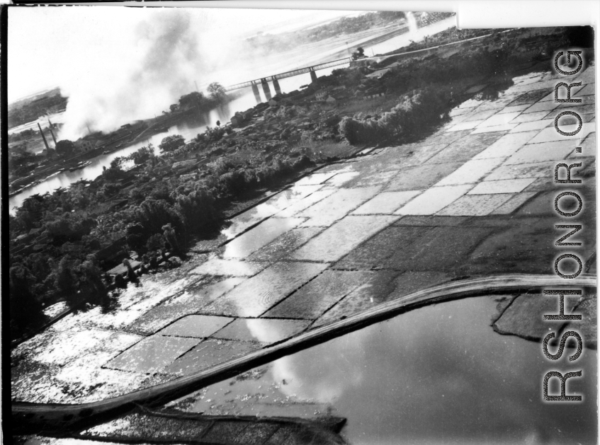 Bombing of Đáp Cầu railway bridge in French Indochina (Vietnam), during WWII. In northern Vietnam, and along a critical rail route used by the Japanese.