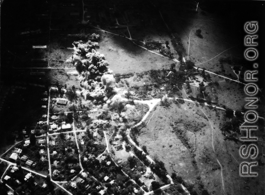 Bombing of small crossroads town in a region of savanna, either in Burma or French Indochina. During WWII.