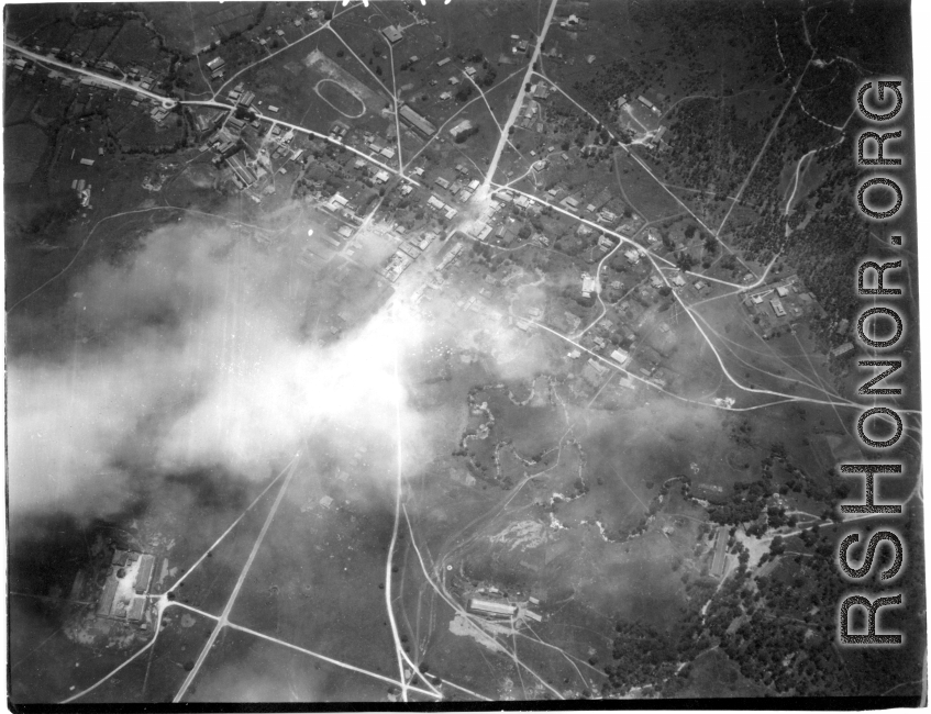 Bombing of small crossroads town, either in Burma or French Indochina. During WWII.