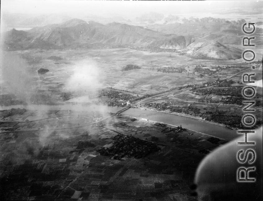 Bombing of Đò Lèn Bridge in Hà Trung Town in French Indochina (Vietnam), during WWII. In northern Vietnam, and along a critical rail route used by the Japanese.