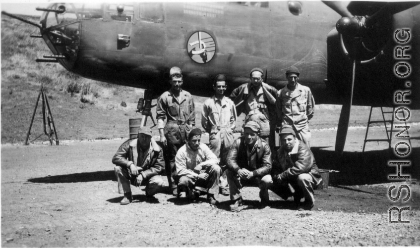 491st Bombardment Squadron mechanics - Gibbs, Butsika, McArdle, Lacher, Pete, Beausoleil, unknown, Kealy - at Yangkai in the spring of 1944.  Of special interest is the number of machine guns sticking from the nose of the "green house." The original B-25Ds had one flexible gun in the center, operated by the bombardier or navigator. Later, 'official' modifications would add two, mounted to the sides of the compartment. Here we also see two which are apparently mounted under the floor of the compartment. Obvi