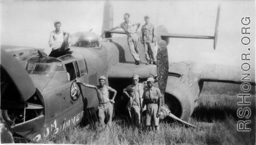Johnson, Macaluso, Gornick, Lemmon pose with a crashed "Rum Runner" B-25 in Liuzhou June 1944.  William "Wild Bill" Gornick completed his required 200 combat flying hours on "Rum Runner" as it crash landed  following  a  mission against Tien Ho airbase.  Bill assisted the maintenance personnel with salvaging all the useable parts they could until he left for the USA a few days later.