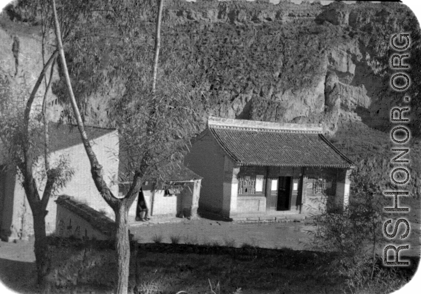 A small building among loess hills in northern China during WWII.