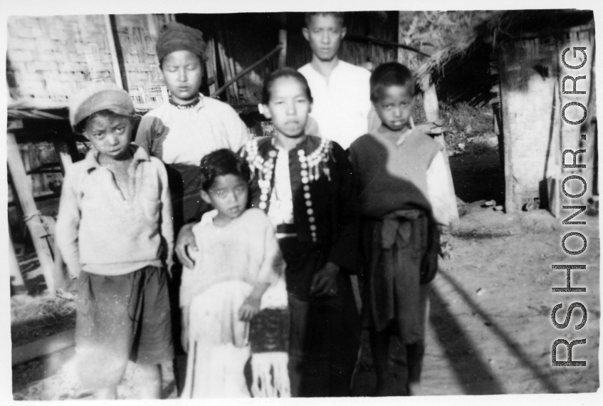 Local people in Burma near the 797th Engineer Forestry Company--Family in Burma.  During WWII.