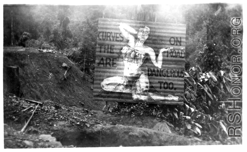 Curvy road sign in Burma, warning of dangers ahead, WWII.