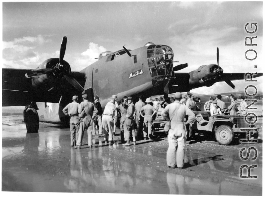 The B-24 bomber "Mud Fish" hard on its tail in China during WWII.  This B-24D, serial #41-24308, was assigned to 425th Bomb Squadron, 308th Bomb Group, at Kunming on 8 Jul 1943. The plane's nose gear was knocked loose hitting a concrete runway roller during takeoff. Then, knocked clear off plane near its bombing target at Haiphong, French Indochina (Vietnam). Returning to base following the mission, Lt. Arthur Karp made a successful mains only landing, but the plane had been damaged beyond repair capability