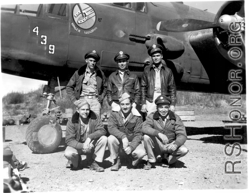 An air crew of the 491st Bomb Squadron posing with B-25J, "Niagra's Belle" combat id #439, at their home base, Yangkai, China, in 1945.  Back row (l-r); Lt. Emory L. Wofford (copilot), Lt. Fred J. Latham (pilot), Lt. Clifford L. Barr (nav-bombardier).  Front (l-r); Center is S/Sgt Manfredo L. Pascarelli (flight engineer). On his right is likely S/Sgt Ray V. Yeager (gunner), and his left is likely Cpl Rosendo B. Rosas, Jr. (radio).