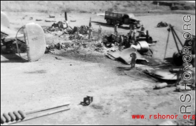 "What One Small Fragmentation Bomb Could Do--This B-24 was hit with one small fragmentation bomb during one of the nightly air raids at Luichow [Liuzhou], China.This particular plane just happened to be a new B-24 that had never flown a mission. As bad as it looks it was not a total loss since the engines were removed, inspected and run-outs done on the crankshafts to be sure they were not damaged. All the engines were used to replace blown engines on the B-24's that were flying gas into China from India. T