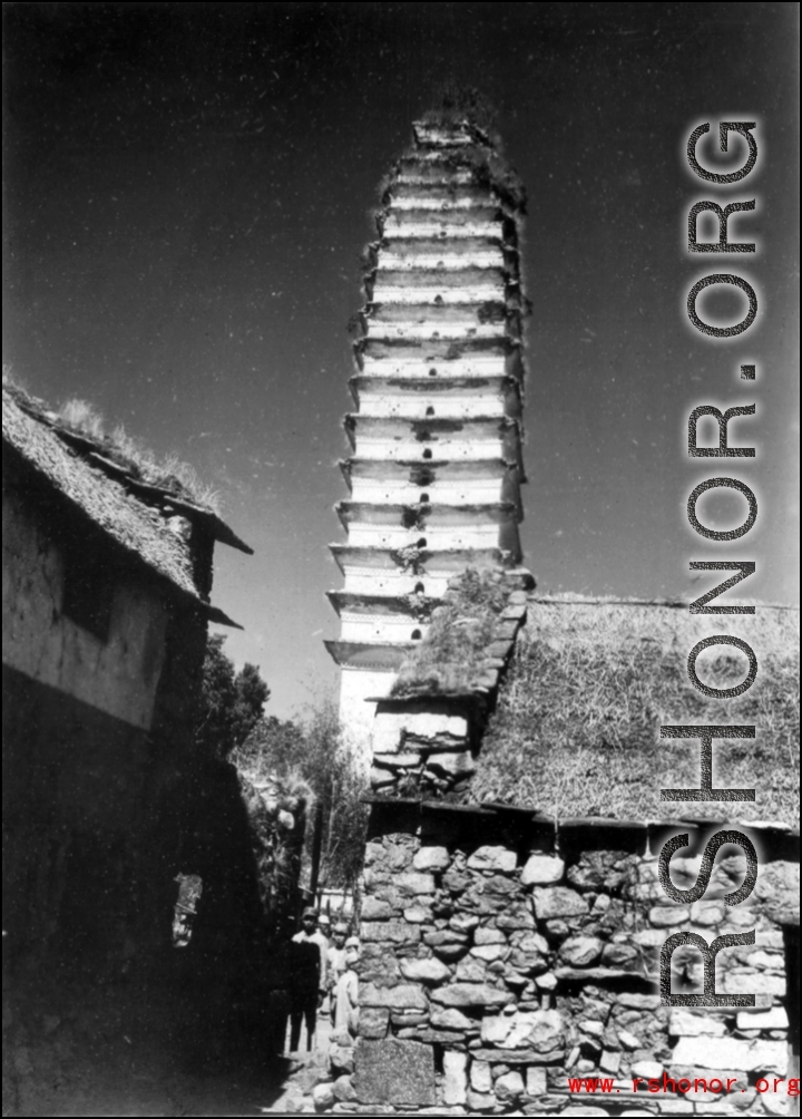 Pagoda in Dali, Yunnan province, China, during WWII. This is one of three pagodas within a single walled compound. The compound a had been appropriated for use by Nationalist troops. Later, after the communist revolution, the compound was also used by troops, but by PLA troops.
