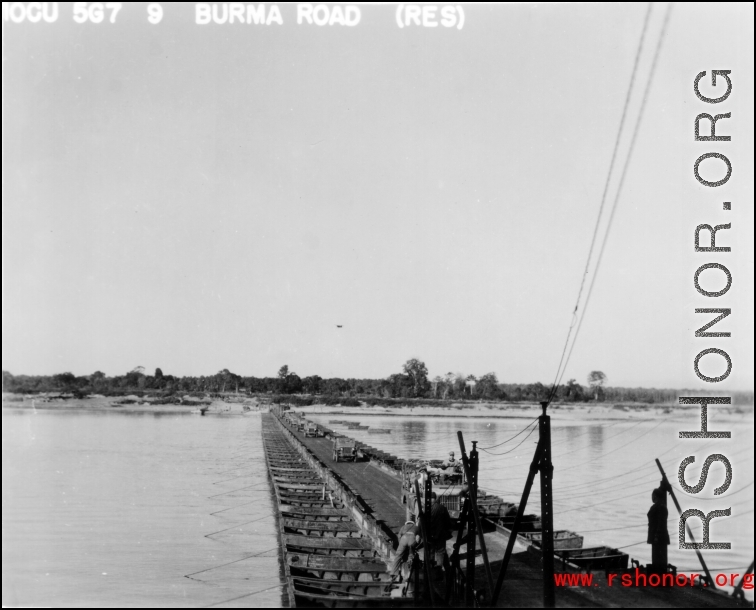 US vehicles cross a pontoon bridge somewhere in Burma.  10CU 5G7 9 BURMA ROAD (RES)